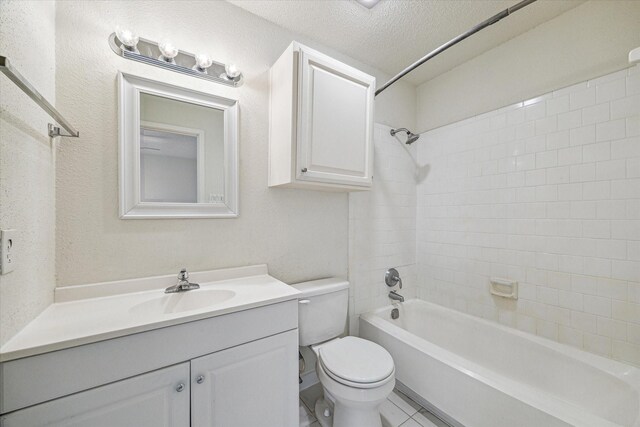 10855 Meadowglen Ln Unit 1030, Houston, TX 77042 - bathroom featuring toilet, a textured ceiling, tub / shower combination, and vanity