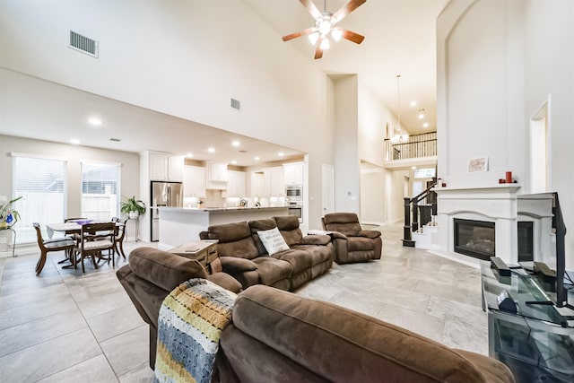 5722 Willow Park Terrace Ln, Porter, TX 77365 - living area with a high ceiling, a ceiling fan, recessed lighting, and light tile patterned flooring