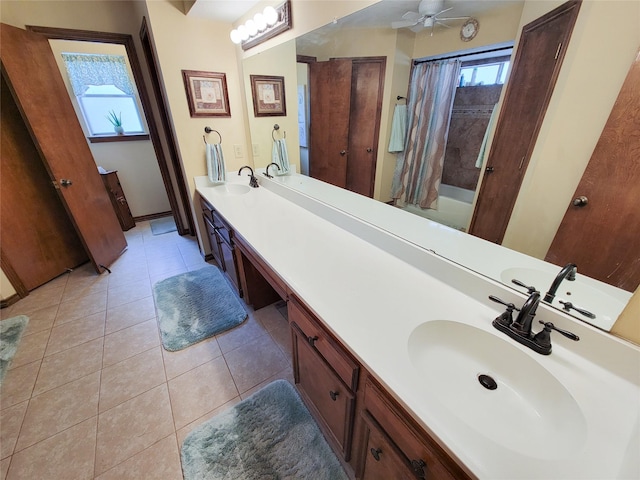 14926 Carols Way Dr, Houston, TX 77070 - full bath with tile patterned floors, double vanity, and a sink