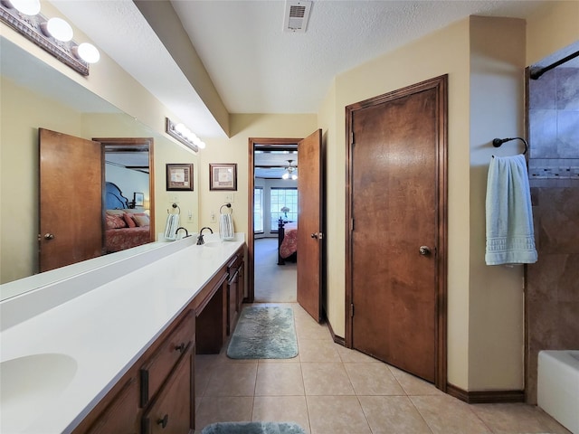 14926 Carols Way Dr, Houston, TX 77070 - ensuite bathroom with a sink, double vanity, visible vents, and ensuite bathroom