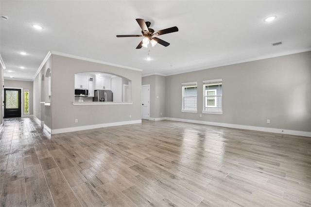unfurnished living room with recessed lighting, ceiling fan, light wood finished floors, and crown molding