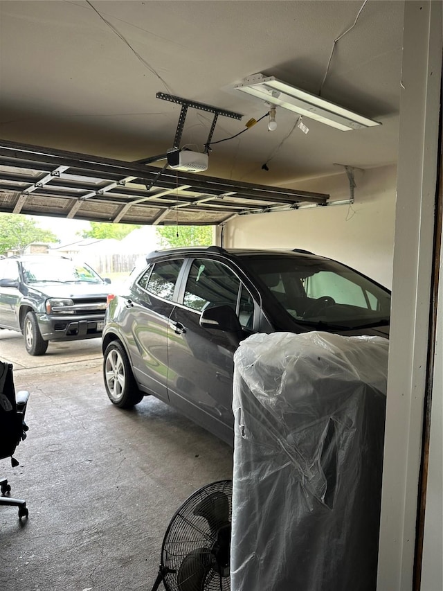 garage featuring a garage door opener