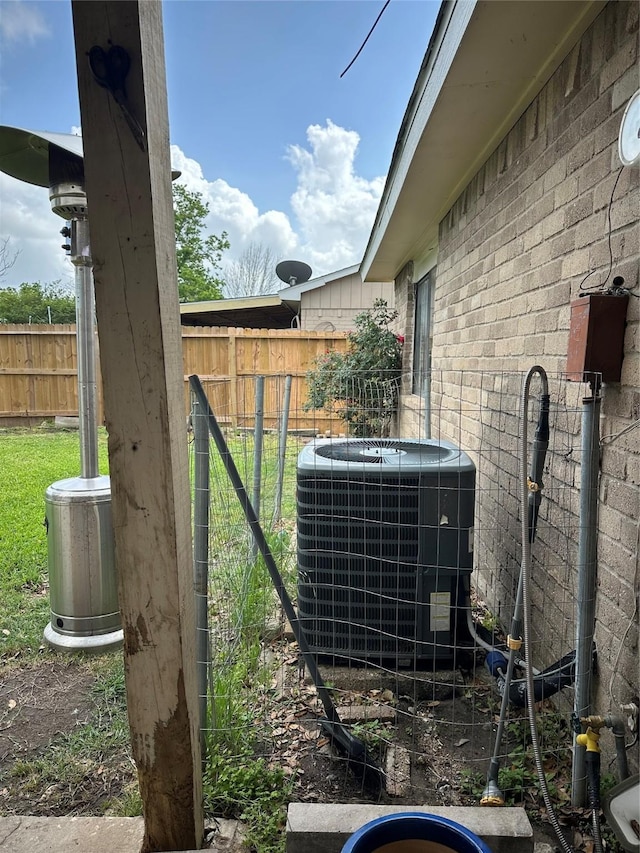 details with fence and central air condition unit