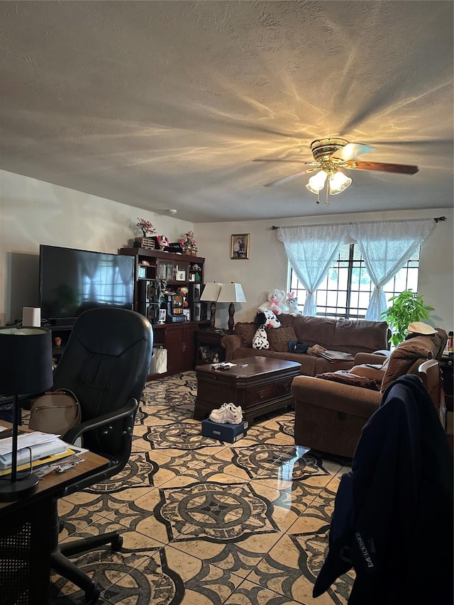 16203 Rapidcreek Dr, Houston, TX 77053 - living area with ceiling fan, an office area, and a textured ceiling