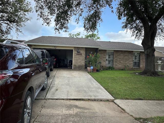 ranch-style house with brick siding, concrete driveway, an attached garage, and a front lawn