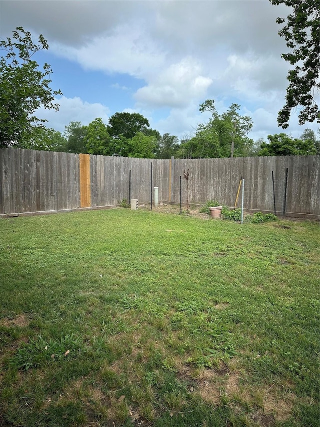 view of yard with fence