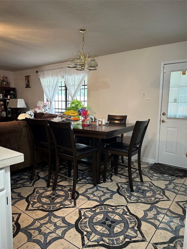 dining room with a chandelier
