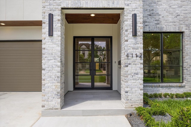 doorway to property featuring french doors