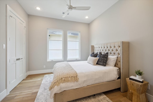 bedroom with recessed lighting, ceiling fan, baseboards, and light wood-style floors