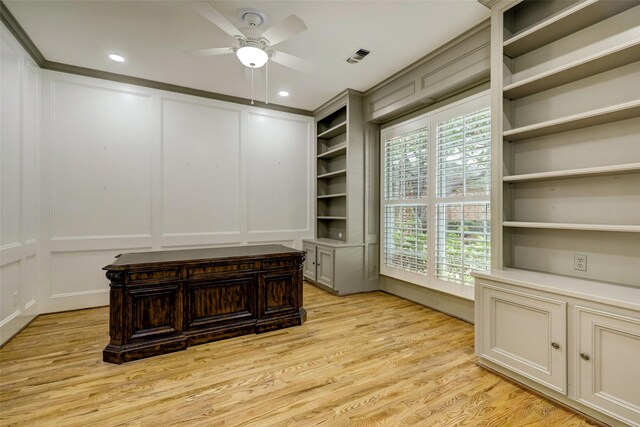4856 Post Oak Timber Dr, Houston, TX 77056 - unfurnished office with a decorative wall, ceiling fan, light wood-type flooring, and visible vents
