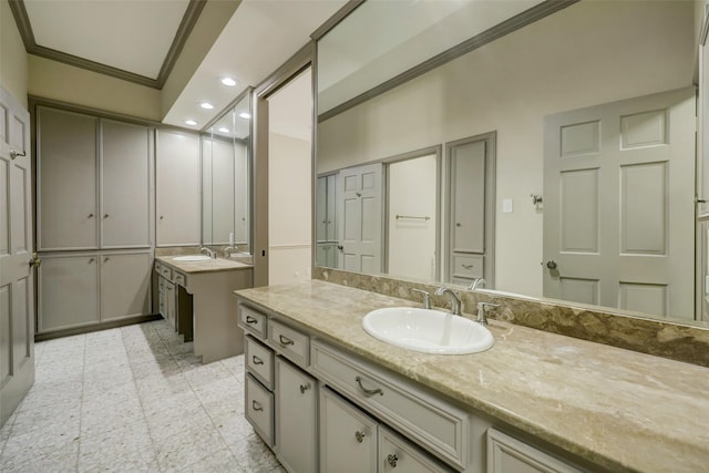 4856 Post Oak Timber Dr, Houston, TX 77056 - full bathroom featuring two vanities, recessed lighting, ornamental molding, and a sink