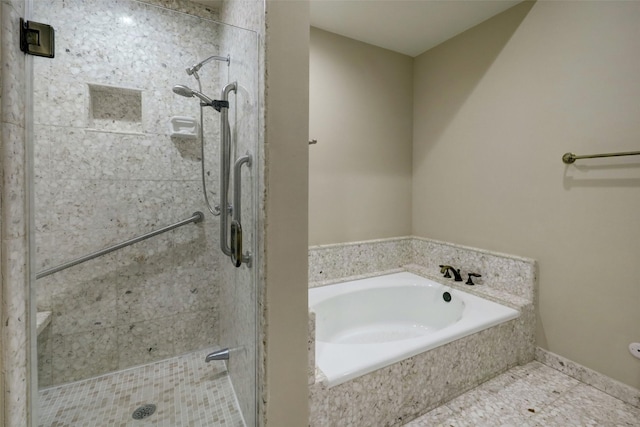 4856 Post Oak Timber Dr, Houston, TX 77056 - bathroom featuring a shower stall, tile patterned flooring, and a bath