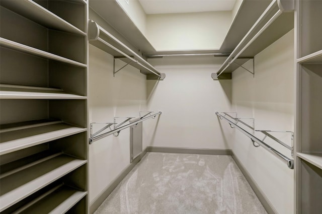 4856 Post Oak Timber Dr, Houston, TX 77056 - walk in closet featuring carpet flooring