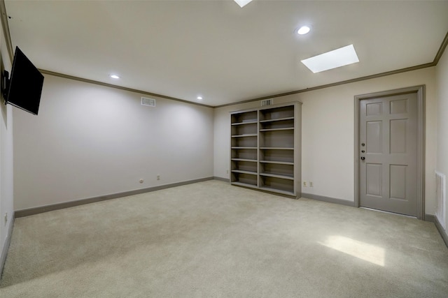 4856 Post Oak Timber Dr, Houston, TX 77056 - finished basement with baseboards, recessed lighting, crown molding, and light colored carpet