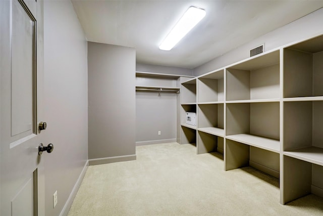 4856 Post Oak Timber Dr, Houston, TX 77056 - spacious closet with visible vents and light colored carpet