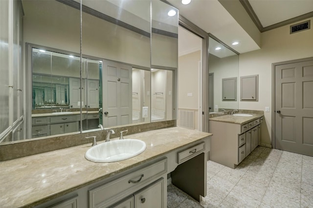 4856 Post Oak Timber Dr, Houston, TX 77056 - full bath with crown molding, a sink, and visible vents