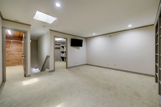 4856 Post Oak Timber Dr, Houston, TX 77056 - below grade area with ornamental molding, recessed lighting, visible vents, and light colored carpet