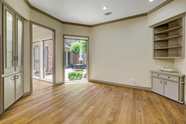 4856 Post Oak Timber Dr, Houston, TX 77056 - unfurnished dining area featuring visible vents, light wood-style floors, baseboards, recessed lighting, and ornamental molding