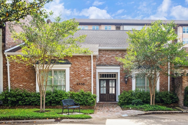 4856 Post Oak Timber Dr, Houston, TX 77056 - townhome / multi-family property featuring brick siding and french doors