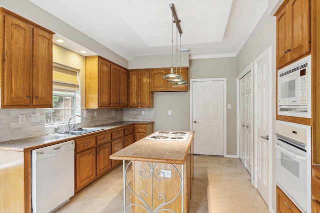 16610 Shadow Path Dr, Houston, TX 77059 - kitchen with white appliances, a sink, a kitchen island, backsplash, and brown cabinetry