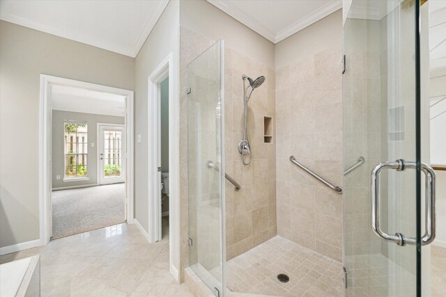 16610 Shadow Path Dr, Houston, TX 77059 - bathroom with a shower stall, baseboards, crown molding, and toilet