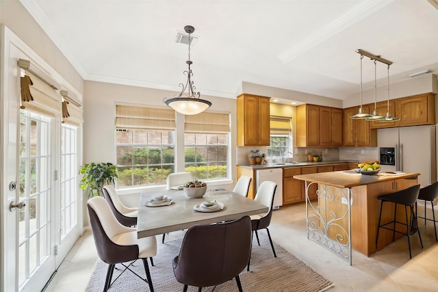 16610 Shadow Path Dr, Houston, TX 77059 - dining area featuring ornamental molding and light tile patterned floors