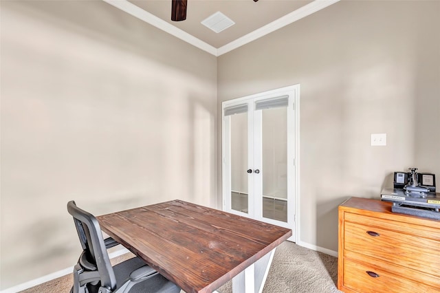 office space with french doors, baseboards, light colored carpet, ceiling fan, and ornamental molding