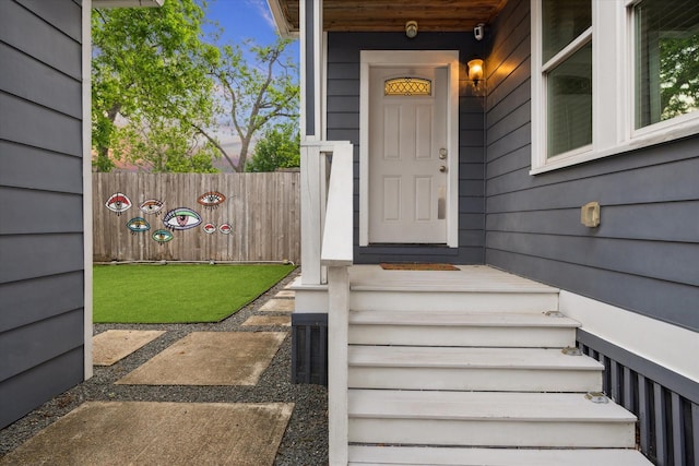 1111 Adele St, Houston, TX 77009 - doorway to property featuring fence
