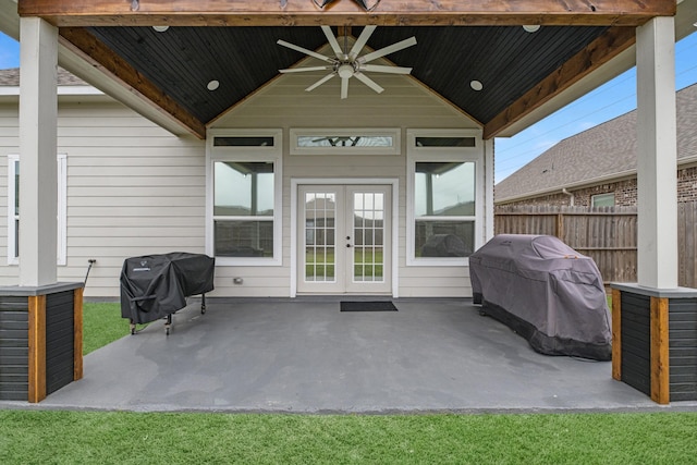 view of patio / terrace featuring area for grilling, ceiling fan, french doors, and fence