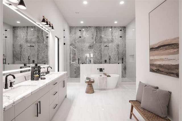 5008 Holt St, Bellaire, TX 77401 - bathroom featuring recessed lighting, a marble finish shower, and a sink