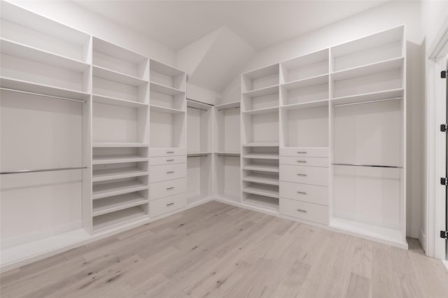 5008 Holt St, Bellaire, TX 77401 - walk in closet featuring light wood-style flooring