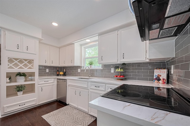 kitchen featuring electric range, white cabinetry, stainless steel dishwasher, and a sink