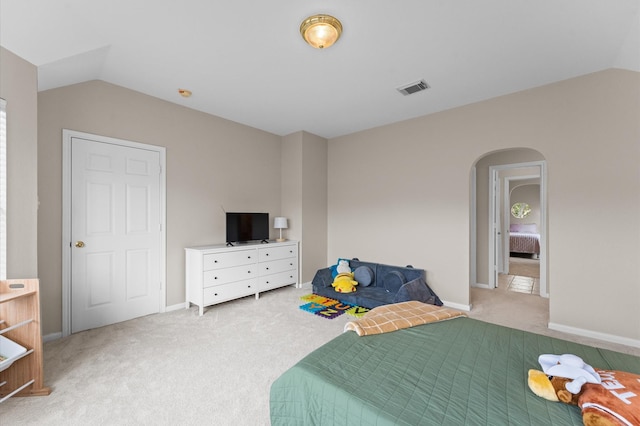 3514 Battle Creek Dr, Missouri City, TX 77459 - bedroom featuring lofted ceiling, arched walkways, carpet flooring, and baseboards