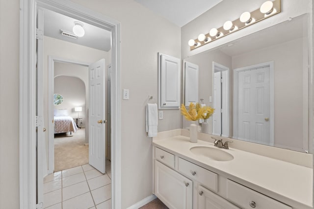 3514 Battle Creek Dr, Missouri City, TX 77459 - ensuite bathroom with tile patterned flooring, vanity, and baseboards