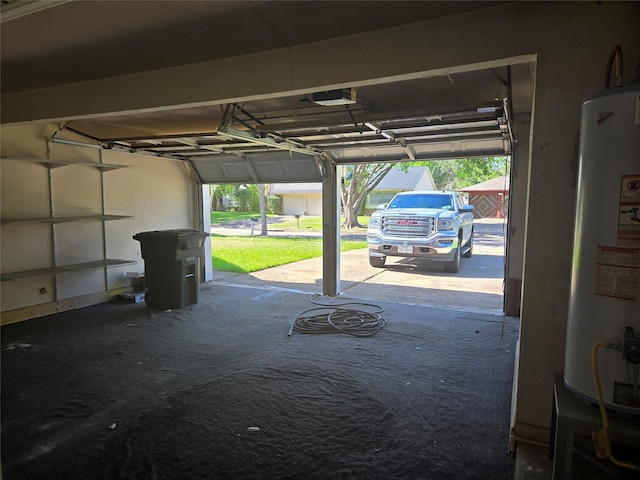 garage featuring a garage door opener and water heater