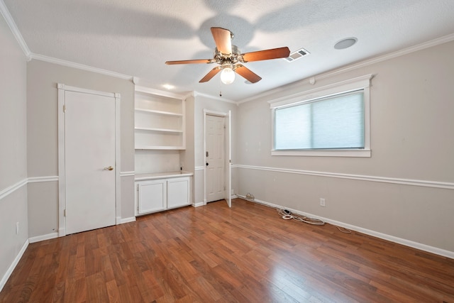 8310 Mentmore Dr, Spring, TX 77379 - unfurnished bedroom with wood finished floors, baseboards, a ceiling fan, ornamental molding, and a textured ceiling