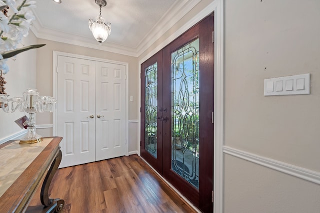 8310 Mentmore Dr, Spring, TX 77379 - entryway with french doors, wood finished floors, crown molding, and a chandelier