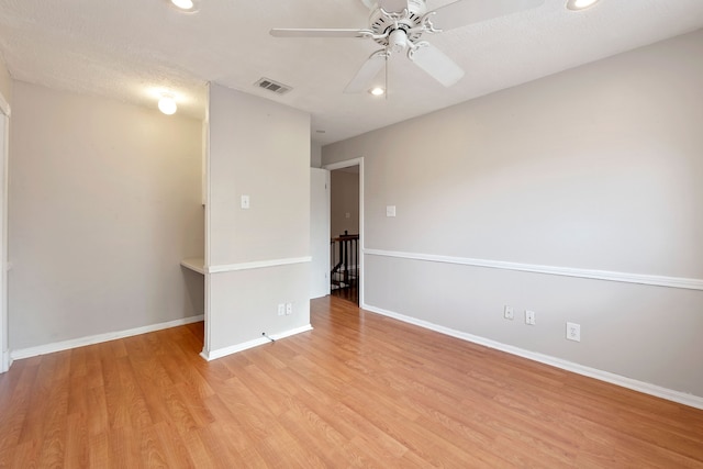 8310 Mentmore Dr, Spring, TX 77379 - spare room featuring a ceiling fan, light wood finished floors, recessed lighting, and baseboards