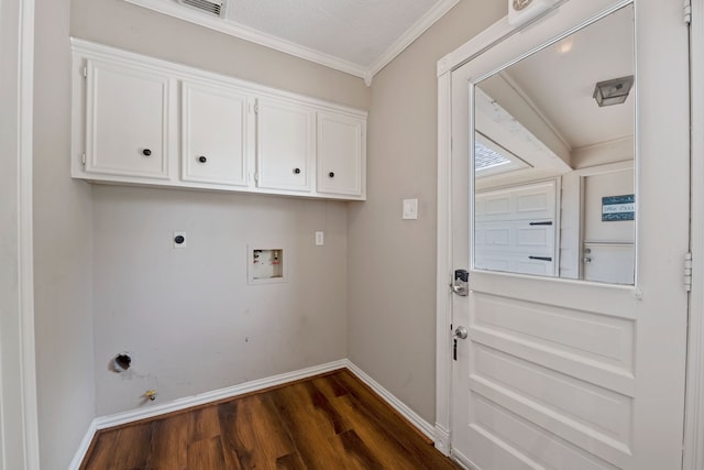 8310 Mentmore Dr, Spring, TX 77379 - washroom featuring hookup for a washing machine, dark wood-style floors, electric dryer hookup, crown molding, and baseboards