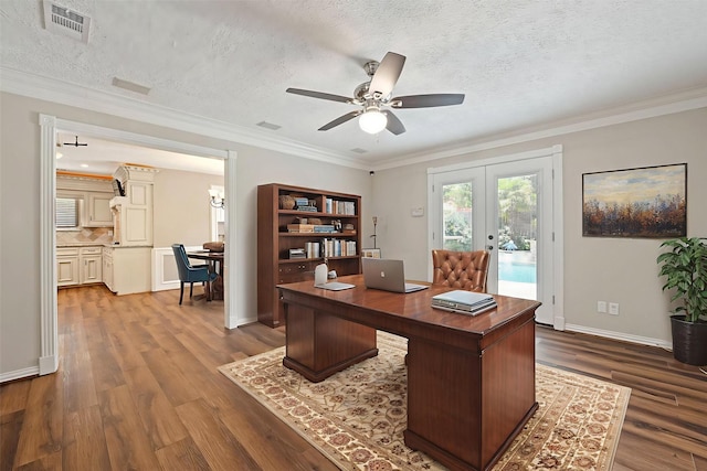 8310 Mentmore Dr, Spring, TX 77379 - home office featuring french doors, dark wood-type flooring, ceiling fan, ornamental molding, and baseboards