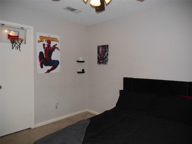 bedroom featuring visible vents, a ceiling fan, carpet, and baseboards
