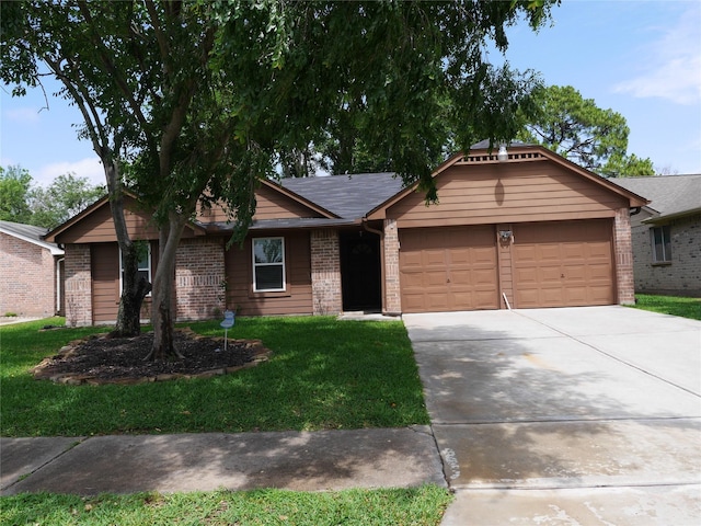 ranch-style home with brick siding, driveway, a front lawn, and a garage