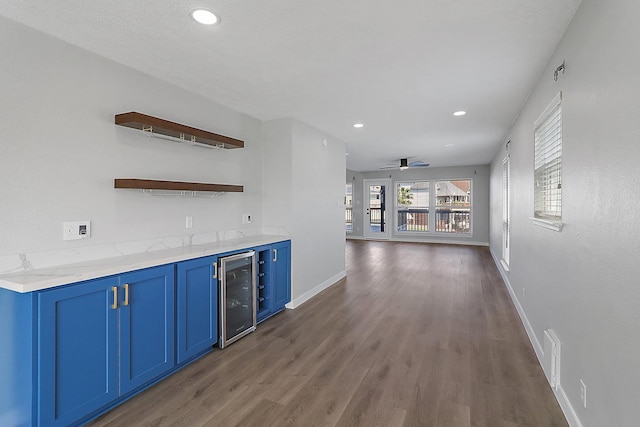 bar with beverage cooler, baseboards, recessed lighting, dark wood-type flooring, and a ceiling fan