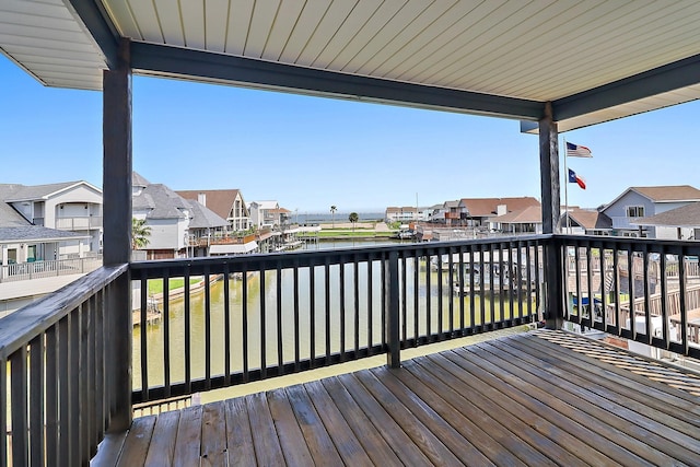 wooden terrace featuring a residential view