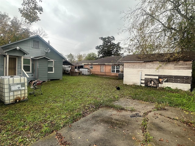 view of yard featuring central AC