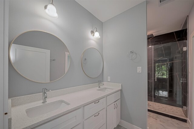 403 Smith St, Dayton, TX 77535 - full bath featuring double vanity, visible vents, a sink, and marble finish floor