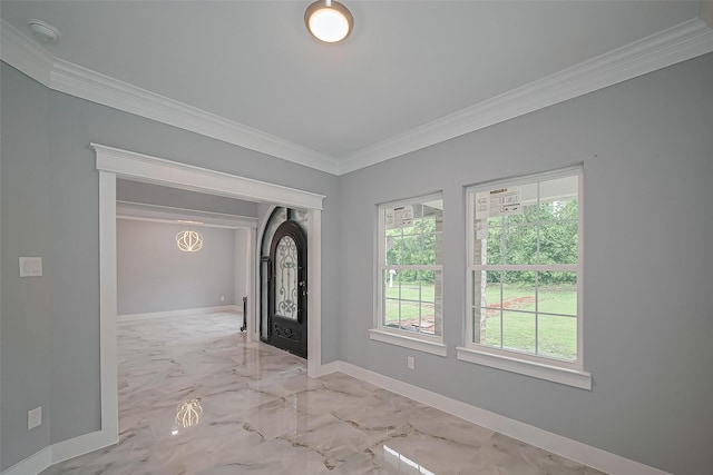 403 Smith St, Dayton, TX 77535 - entrance foyer featuring crown molding, marble finish floor, baseboards, and a wealth of natural light