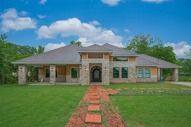 403 Smith St, Dayton, TX 77535 - prairie-style house with stone siding, stucco siding, and a front lawn