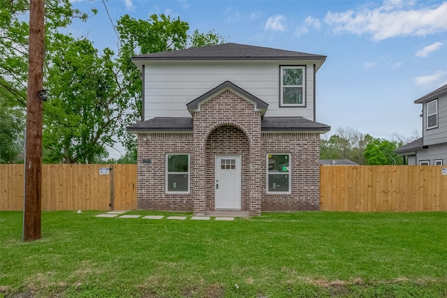 9003 Hilda St, Houston, TX 77033 - traditional-style home featuring brick siding, a shingled roof, and a gate