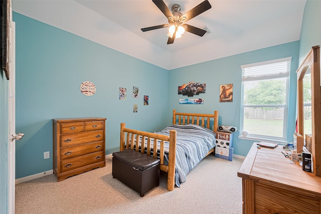 1839 Pembrook Cir, Conroe, TX 77301 - carpeted bedroom with baseboards, visible vents, and a ceiling fan